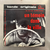 Un Témoin Dans La Ville
